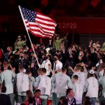 Flag bearers Sue Bird and Eddy Alvarez of Team United States lead their team out during the Opening Ceremony of the Tokyo 2020 Olympic Games at Olympic Stadium on July 23, 2021 in Tokyo, Japan. (Photo by Clive Rose/Getty Images)