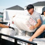 City employees from Lehi, Draper and Vineyard prepare donated sandbags for travel to Cedar City and Moab on July 29, 2021. (Vineyard City)