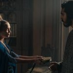 Essel (Alicia Vikander) tempts Gawain's (Dev Patel) virtue
