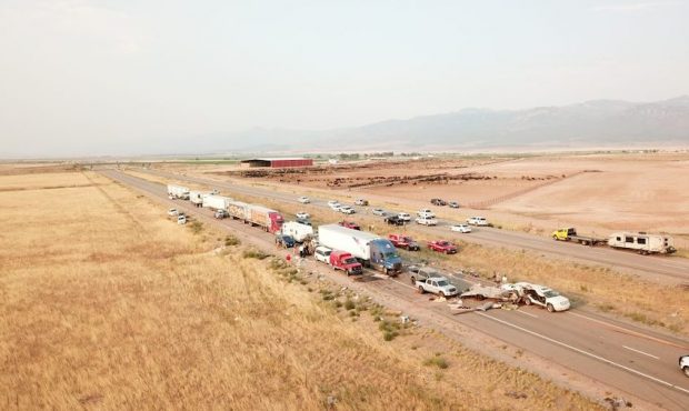 Aerial photo provided by the Utah Highway Patrol shows the aftermath of a crash that left eight dea...