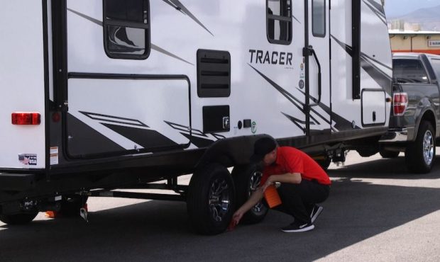 General RV’s Zac Andersen preps a camper on his lot before unhooking it from the truck. (Ken Fall...