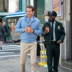 Ryan Reynolds as Guy and Lil Rel Howery as Buddy in 20th Century Studios’ FREE GUY. Photo by Alan Markfield. © 2020 Twentieth Century Fox Film Corporation.  All Rights Reserved.
