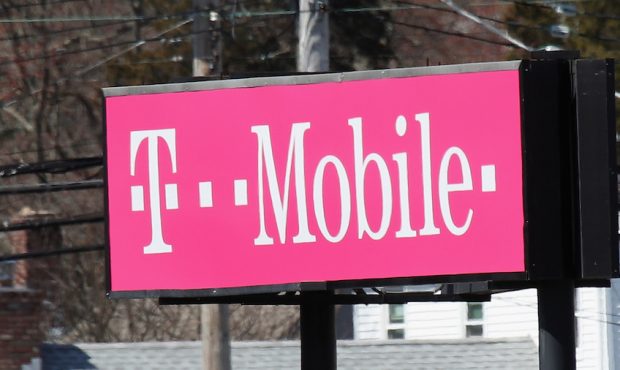 FILE: A T-Mobile store sign is seen on March 26, 2020, in Huntington Station, New York. (Photo by B...