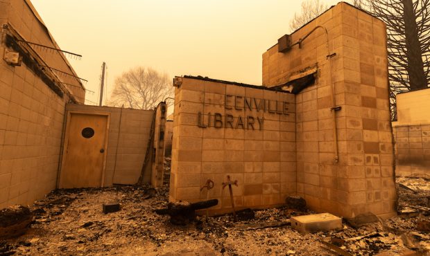 The Greenville Library is surrounded by rubble as the Dixie Fire continues to burn on August 6, 202...