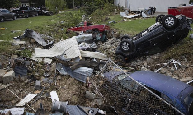 Vehicles swept away by flood waters are seen on August 23, 2021, in Waverly, Tennessee. Heavy rains...