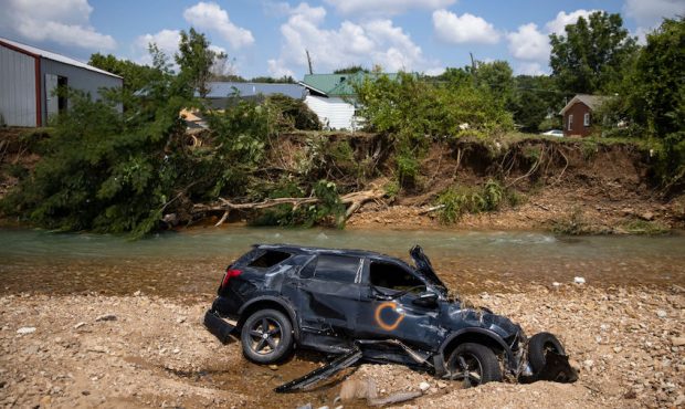 A heavily flood damaged vehicle is seen in Trace creek on August 23, 2021 in Waverly, Tennessee. He...