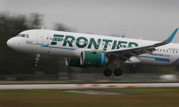 FILE: A Frontier airlines plane lands at the Miami International Airport on June 16, 2021 in Miami,...