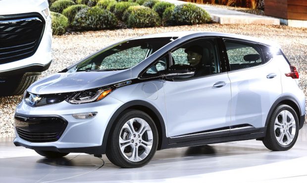 FILE: The all-electric Chevrolet Bolt EV is shown on stage after it won the Car of the Year Award a...