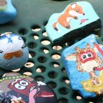 Mishala Petersen says she’s painted hundreds of rocks. She finds ideas online as inspiration for her creations. (Ken Fall/KSL TV)