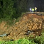 State troopers along with various other agencies are at the scene of a road collapse in George County, Mississippi, on Highway 26 near Crossroads Road. (Mississippi Highway Patrol)