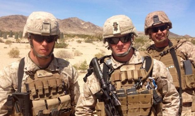 Marine Staff Sgt. Taylor Hoover (pictured middle) of Sandy was killed in August 2021 in a suicide b...