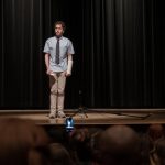 Evan Hansen (Ben Platt) stands in front of his fellow classmates to eulogize Connor Murphy in Universal Pictures' "Dear Evan Hansen".
