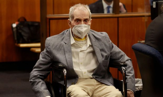 Robert Durst in his wheelchair spins in place as he looks at people in the courtroom as he appears ...