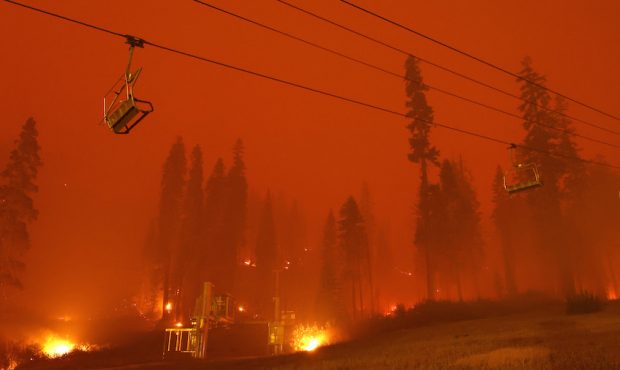A chairlift at Sierra-at Tahoe ski resort sits idle as the Caldor Fire moves through the area on Au...