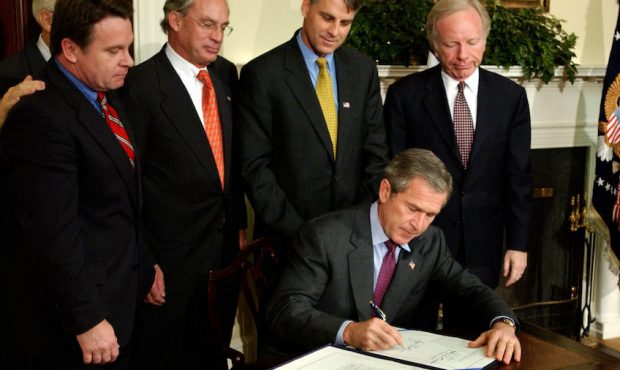 FILE: President George W. Bush signs a bill to create an independent commission to investigate the ...