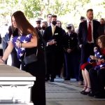 Marine Staff Sgt. Taylor Hoover, from Sandy, is laid to rest at Arlington National Cemetery.