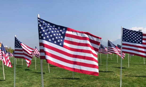 A large number of American flags, honoring the victims of the Sept. 11 terrorist attacks, are on di...