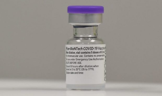 A phial of Pfizer-BioNTech COVID-19 vaccine is seen at a vaccination health centre on the first day...