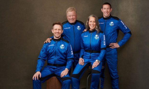 This undated photo made available by Blue Origin in October 2021 shows, from left, Chris Boshuizen,...