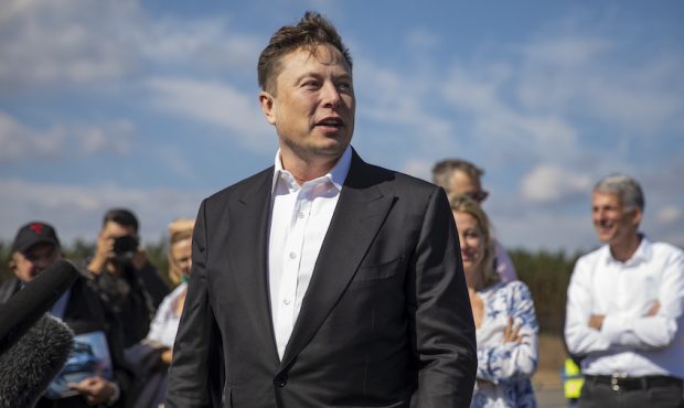 FILE: Tesla head Elon Musk talks to the press as he arrives to to have a look at the construction s...