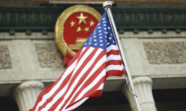 FILE: The U.S. flag flies at a welcoming ceremony between Chinese President Xi Jinping and U.S. Pre...