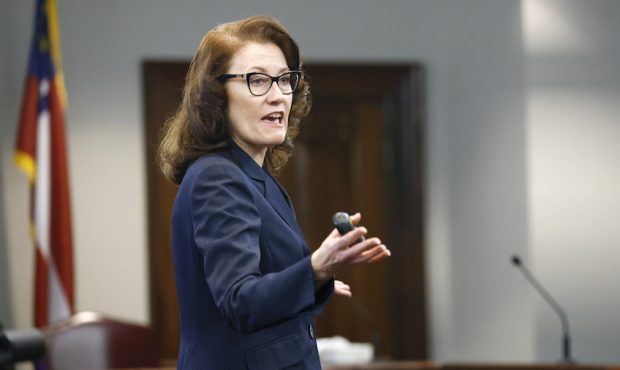 Prosecutor Linda Dunikoski speaks during opening statements in the trial of the accused killers of ...