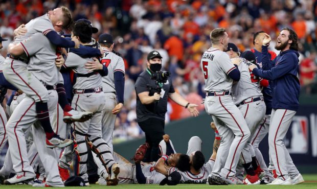 The Atlanta Braves celebrate their 7-0 victory against the Houston Astros in Game Six to win the 20...