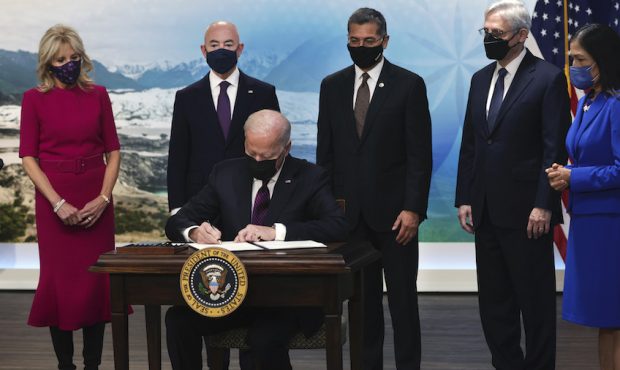 President Joe Biden signs an executive order to help improve public safety and justice reform for N...