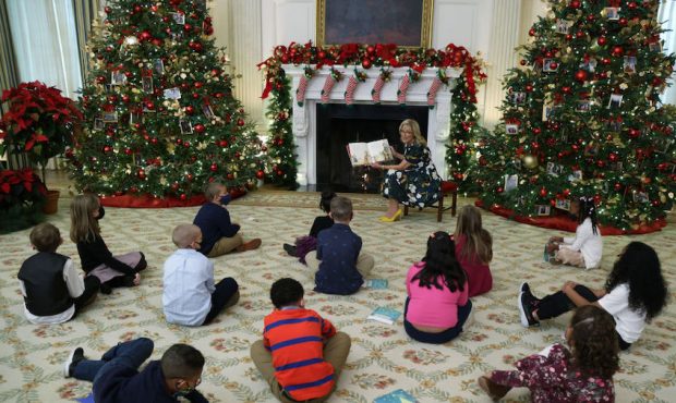 U.S. first lady Jill Biden reads her book Don’t Forget, God Bless our Troops to a second-grade cl...