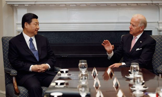 FILE: Then-Vice President Joe Biden (R) and Chinese then-Vice President Xi Jinping hold an expanded...