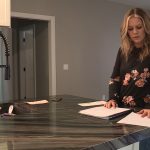 Jennifer Curtis goes through her payments to her contractor. (KSL TV)