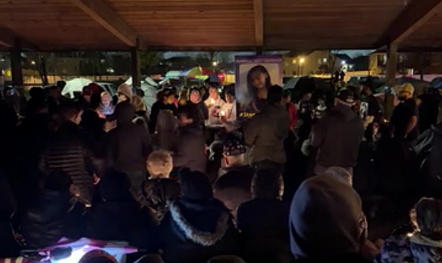 Dozens of people gathered at a vigil for 10-year-old "Izzy" Faith Tichenor. (KSL TV)...
