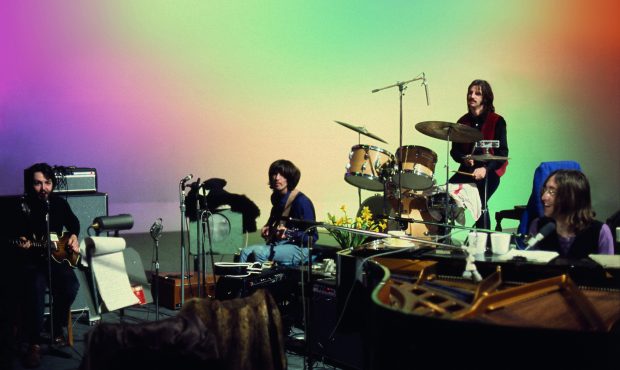 This image released by Disney+ shows, from left, Paul McCartney, George Harrison, Ringo Starr and J...