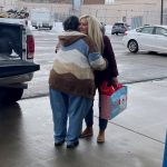 Audra Post, R.N., collects Sub for Santa gifts and unites fellow staff in a common goal at the Heber Valley Hospital  emergency department. (KSL TV)