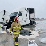 A semi-truck crash temporarily closed lanes on I-215 near North Temple in Salt Lake City. (Salt Lake City Fire Department)