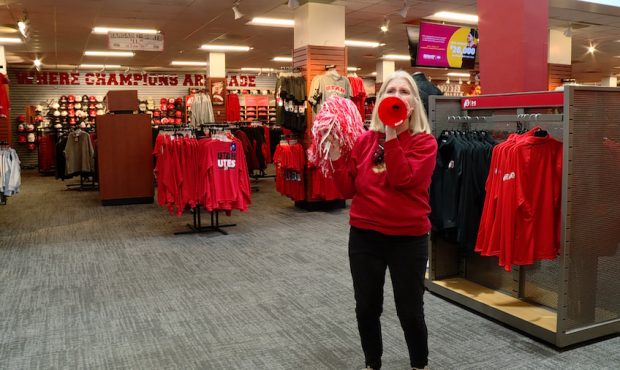Pam Cannon, a big fan of the Utes football team, shows off her excitement following the Pac-12 
Cha...