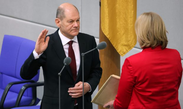 New German Chancellor Olaf Scholz takes his oath of office from Bundestag President Baerbel Bas dur...