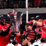 The Utah Utes celebrate after winning the PAC 12 Championship Saturday night. The Utes will play Ohio State in the Rose Bowl on Jan. 1. (KSL TV)