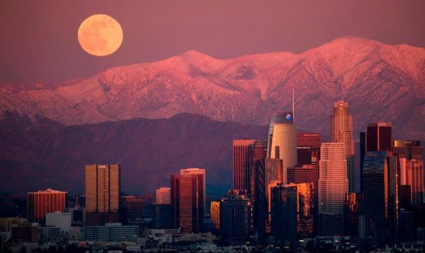The last full moon of 2020, also known as the cold moon, rises behind the San Gabriel Mountains at ...
