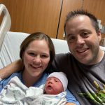 Bethany and Scott England smile as they hold their newborn daughter, Piper. (Intermountain Healthcare)
