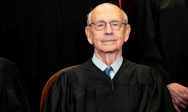 Associate Justice Stephen Breyer sits during a group photo of the Justices at the Supreme Court in ...