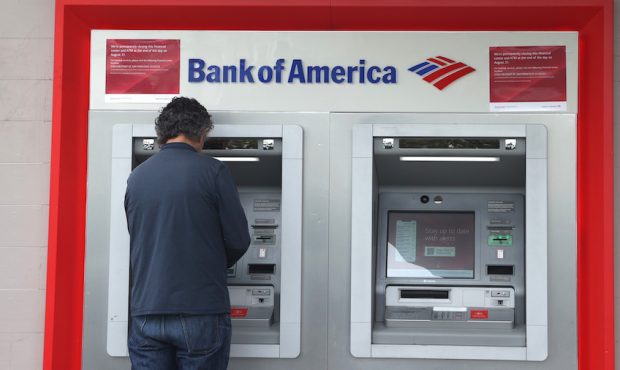 A Bank of America customer uses an ATM at a Bank of America branch office on July 14, 2021 in San F...