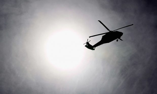 FILE PHOTO: KUWAIT CITY, KUWAIT - DECEMBER 15: A U.S. Army helicopter flies over Camp Virginia on D...