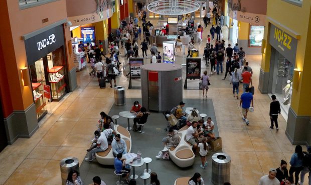 FILE: Shoppers visit the Dolphin Mall on December 21, 2021 in Miami, Florida. Shoppers are seeing h...