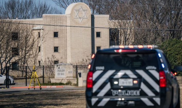 A law enforcement vehicle sits near the Congregation Beth Israel synagogue on January 16, 2022 in C...