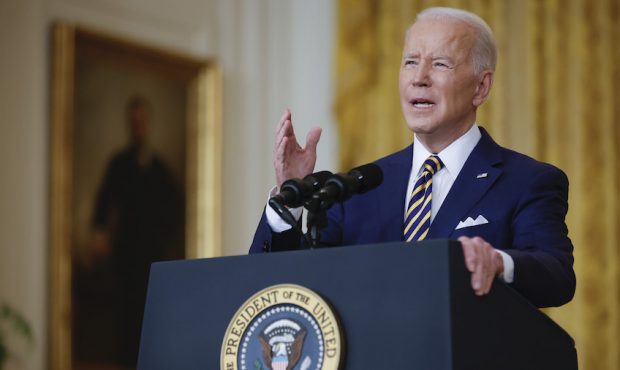 President Joe Biden makes an opening statement during a news conference in the East Room of the Whi...