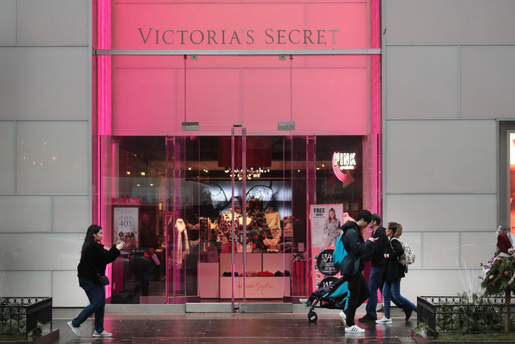 CHICAGO, ILLINOIS - NOVEMBER 21: Shoppers walk past a Victoria's Secret store along the Magnificent...