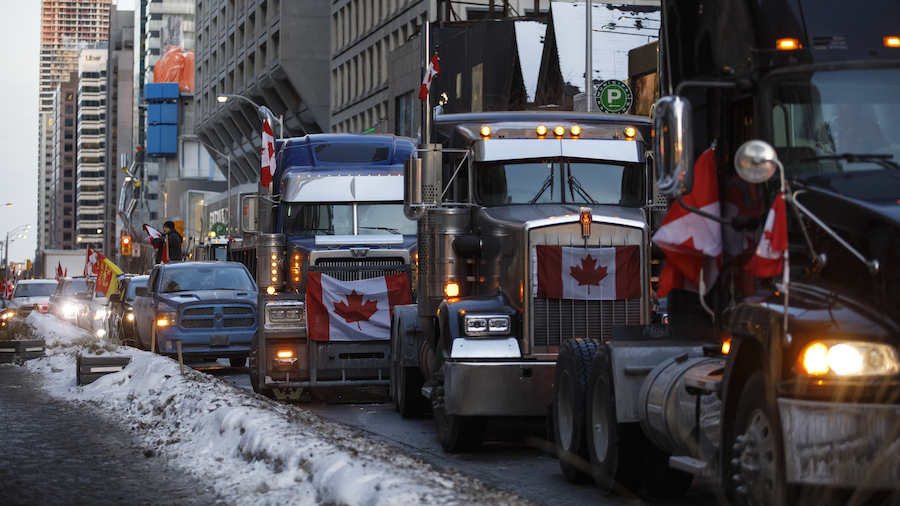 Trucks line Bloor near Yorkville on Feb. 5, 2022, in Toronto, Canada. A convoy of truckers and supp...