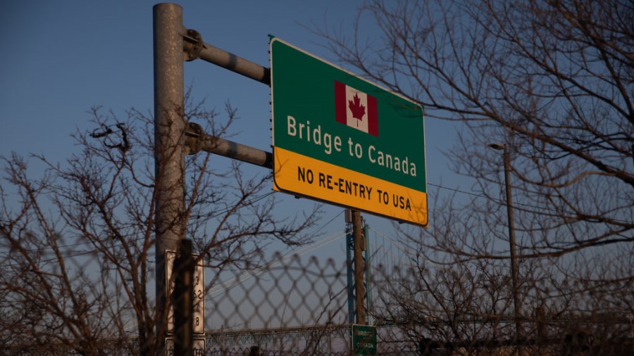 DETROIT, MI - FEBRUARY 08: A sign leading to the Ambassador bridge to Canada on February 8, 2022 in...