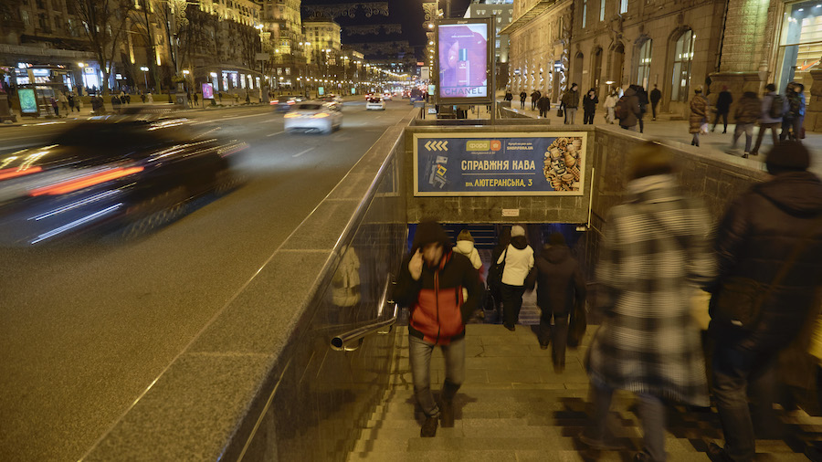 People are walking down an underpass on February 21, 2022, in Kyiv, Ukraine. The city's authorities...